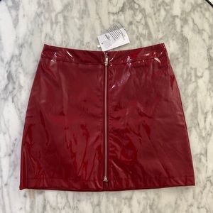 Dolls Kill dark red vinyl zip up mini skirt